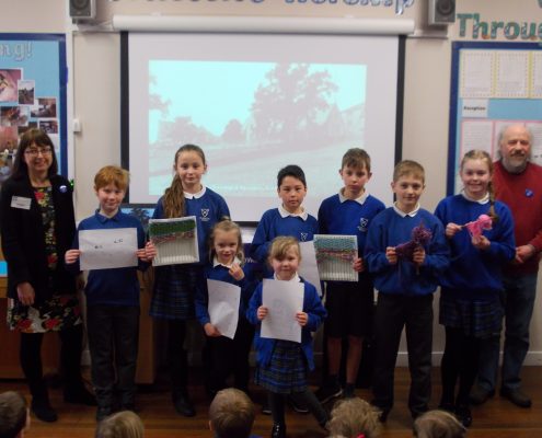 Pupils displaying work done during the day
